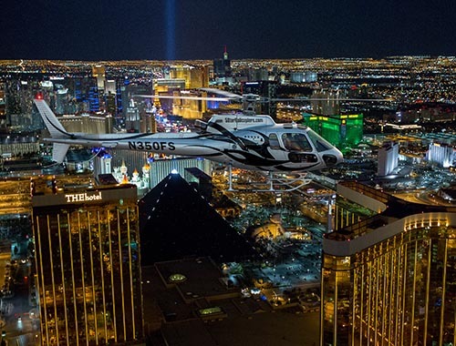 Celebrate your stay with a Las Vegas helicopter night Strip flight, as you soar over the dazzling Las Vegas Strip City lights - including hotel pickup and drop-off!